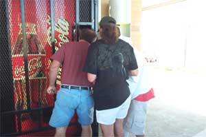 the guys wrestle with a coke machine at a rest stop in Utah